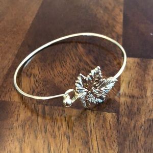 Gold maple leaf clasp bangle